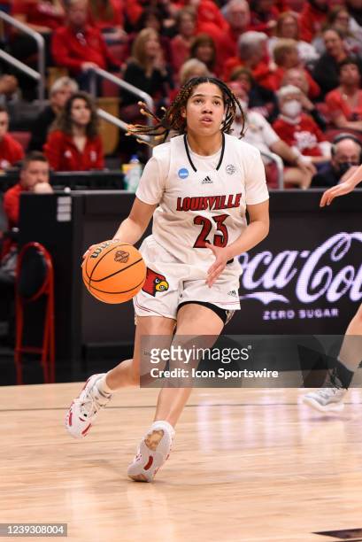 Louisville guard Chelsie Hall drives to the basket during the first round of the NCAA Women's National Championship Tournament college basketball...