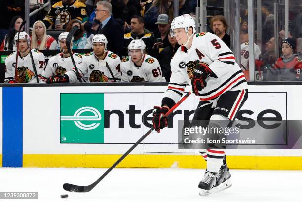 Chicago Blackhawks defenseman Connor Murphy passes the puck during a game between the Boston Bruins and the Chicago Blackhawks on March 10 at TD...