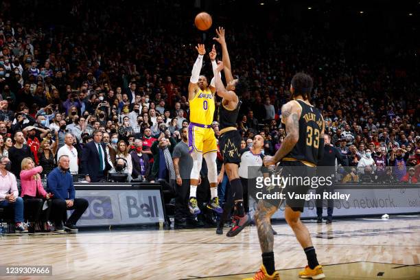 Russell Westbrook of the Los Angeles Lakers shoots a three-point-basket to tie the game against the Toronto Raptors on March 18, 2022 at the...