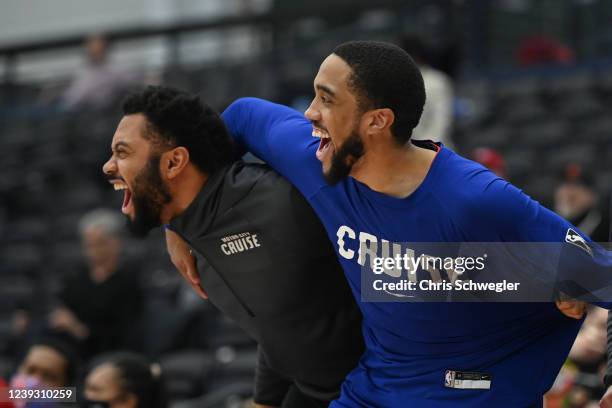ShawnDre' Jones of the Motor City Cruise and assistant coach Xavier Silas react to a play during the 1st quarter of the game against the Capitol City...