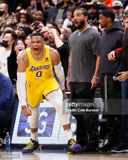 Russell Westbrook of the Los Angeles Lakers celebrates a game-tying basket to send the game into overtime during the second half of their NBA game...