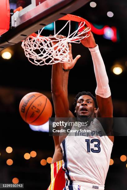 Jaren Jackson Jr. #13 of the Memphis Grizzlies dunks during a game against the Atlanta Hawks at State Farm Arena on March 18, 2022 in Atlanta,...