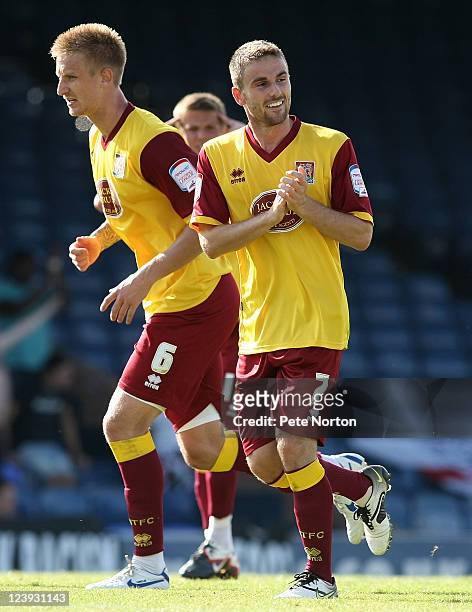 Arron Davies of Northampton Town celebrates after scoring his sides second goal during the npower League Two match between Southend United and...
