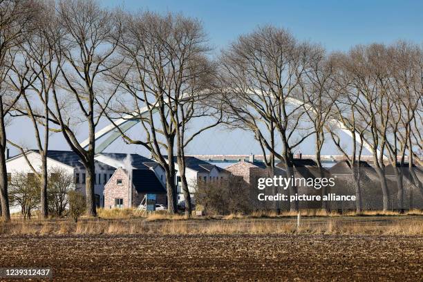 March 2022, Schleswig-Holstein, Fehmarn: The sun is shining on vacation homes on the island of Fehmarn. The booking situation in the resorts in the...