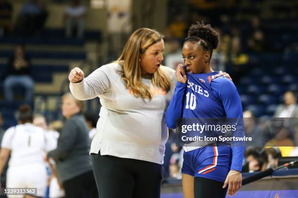 Houston Baptist Huskies head coach Donna Finnie talks to Houston Baptist Huskies center Elizabeth Matadi during a first round basketball game of the...