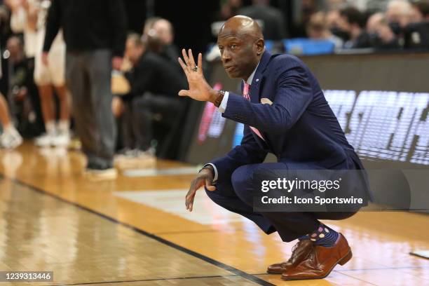 Yale Bulldogs head coach James Jones tells his team to relax during the first round the NCAA Division I Mens Basketball Championship between the...