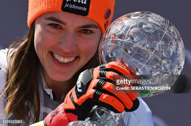 Slovakia's Petra Vlhova celebrates her small Globe after winning the Women's slalom season at the FIS Alpine Ski World Cup finals 2021/2022 in...