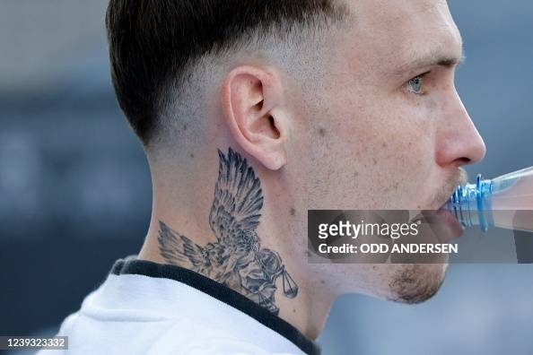 A tattoo is seen on the neck of Hoffenheim's German defender David... News  Photo - Getty Images