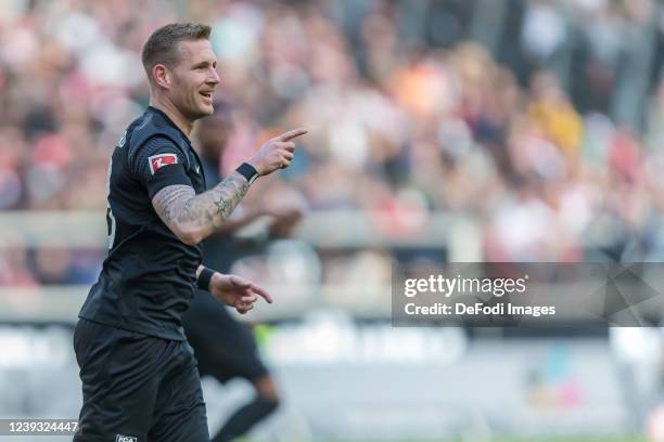 Andre Hahn of FC Augsburg celebrates after scoring his team's first goal during the Bundesliga match between VfB Stuttgart and FC Augsburg at...