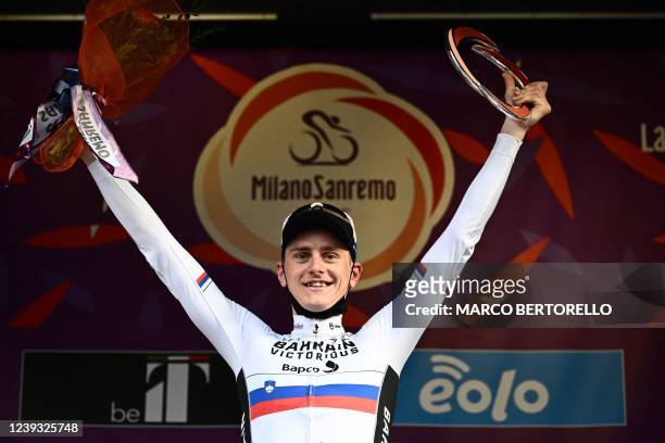 Team Bahrain's Matej Mohoric of Slovenia celebrates on the podium after winning the 113th Milan-San Remo one-day classic cycling race, on March 19,...
