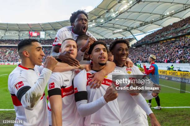 Omar Khaled Mohamed Marmoush of VfB Stuttgart celebrates after scoring his team's second goal with teammates during the Bundesliga match between VfB...