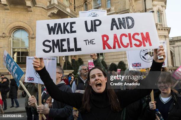 Demonstrators gather outside the BBC Broadcasting House ahead of a march to oppose racism, Islamophobia, antisemitism and fascism, and to express...