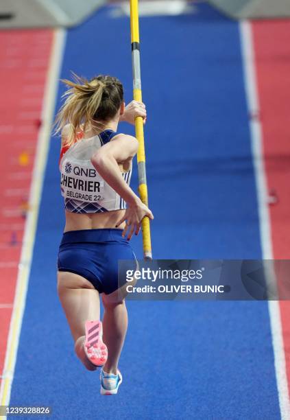 France's Margot Chevrier competes in the women's pole vault final during The World Athletics Indoor Championships 2022 at the Stark Arena, in...
