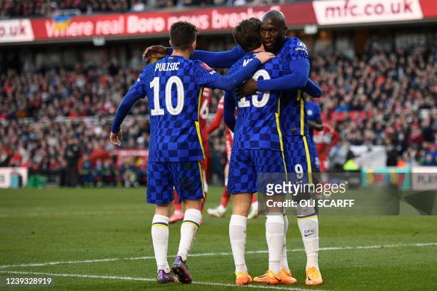 Chelsea's Belgian striker Romelu Lukaku celebrates with Chelsea's English midfielder Mason Mount and Chelsea's US midfielder Christian Pulisic after...