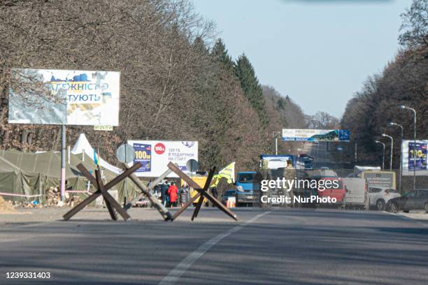 Military control checkpoint by Ukrainian armed forces on the road towards the borders. Defend anti-tank obstacles, military - police checkpoints...