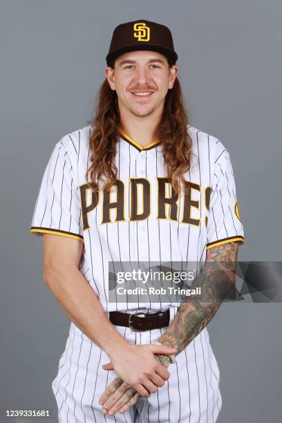 Mike Clevinger of the San Diego Padres poses for a photo during the San Diego Padres Photo Day at Peoria Sports Complex on Thursday, March 17, 2022...