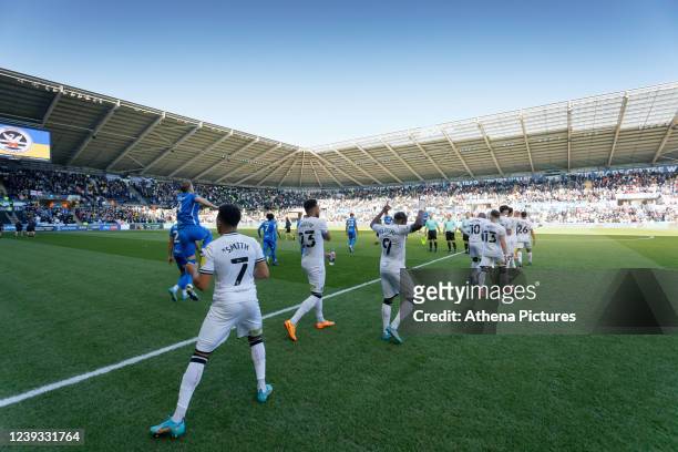 Swansea players exit the tunnel prior to the Sky Bet Championship match between Swansea City and Birmingham City at the Swansea.com Stadium on March...