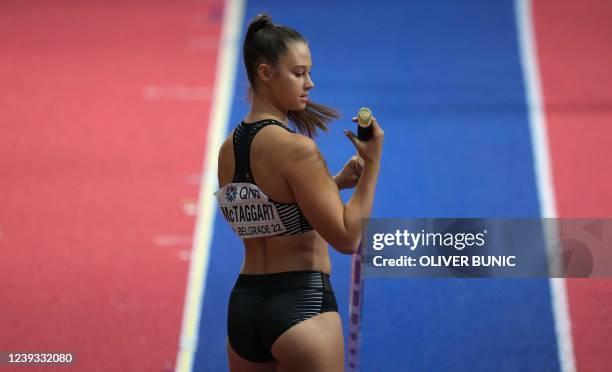 New Zealand's Olivia McTaggart competes in the women's pole vault final during The World Athletics Indoor Championships 2022 at the Stark Arena, in...