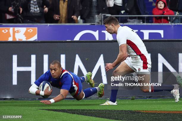 France's centre Gael Fickou scores a try during the Six Nations rugby union tournament match between France and England at the Stade de France in...