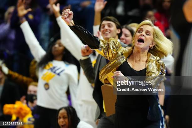 Tigers head coach Kim Mulkey celebrates after a play during the first half of the game between the LSU Tigers and the Jackson State Lady Tigers...
