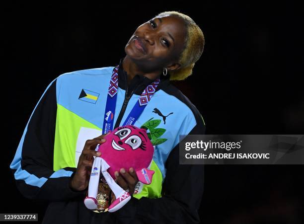 Gold medallist Bahamas' Shaunae Miller-Uibo stands on the podium during the Victory Ceremony for the women's 400m during The World Athletics Indoor...