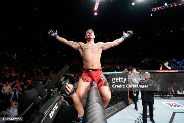 Tom Aspinall of England celebrates his submission victory over Alexander Volkov of Russia in a heavyweight fight during the UFC Fight Night event at...