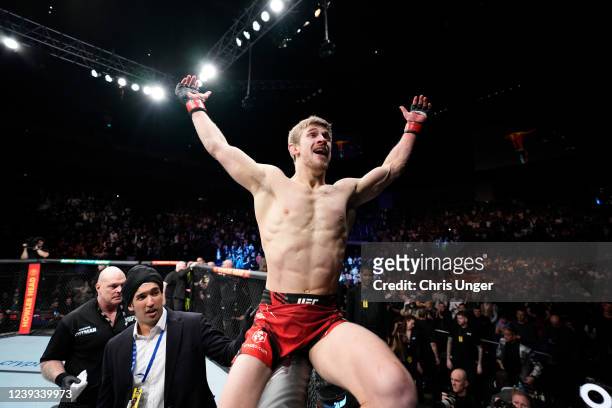 Arnold Allen of England celebrates his TKO victory over Dan Hooker of New Zealand in a featherweight fight during the UFC Fight Night event at O2...