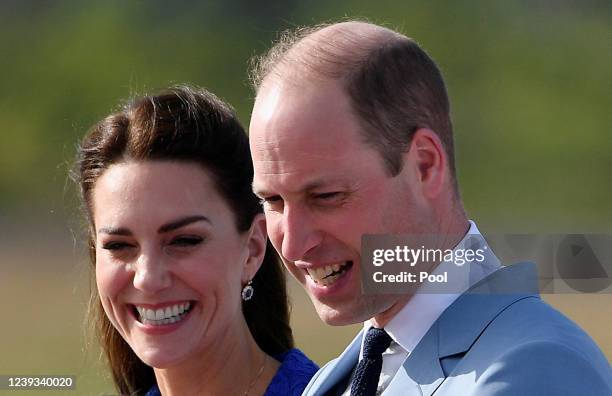 Catherine, Duchess of Cambridge and Prince William, Duke of Cambridge arrive at Philip S. W Goldson International Airport to start their Royal Tour...