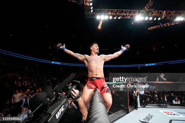 Tom Aspinall of England celebrates his submission victory over Alexander Volkov of Russia in a heavyweight fight during the UFC Fight Night event at...