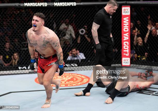 Tom Aspinall of England celebrates his submission victory over Alexander Volkov of Russia in a heavyweight fight during the UFC Fight Night event at...