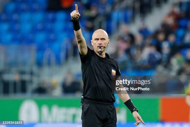 Referee Sergey Karasev gestures during the Russian Premier League match between FC Zenit Saint Petersburg and FC Arsenal Tula on March 19, 2022 at...