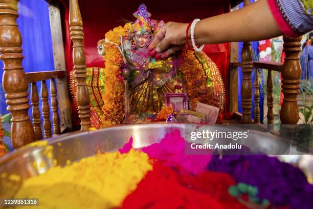 Bangladeshi people spread abir as celebration Dol Purnima festival on March 18 in Dhaka, Bangladesh.