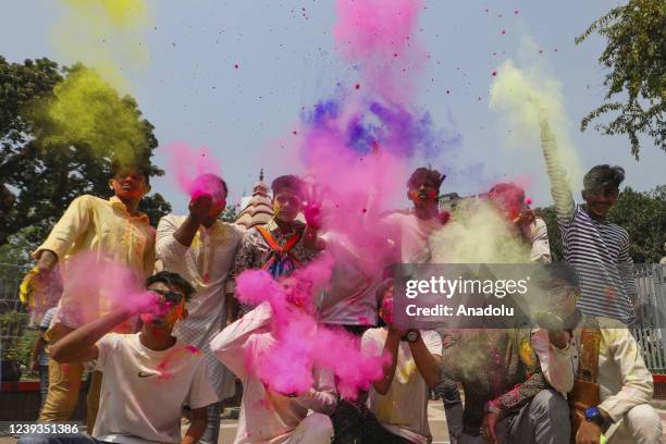 Bangladeshi people spread abir as celebration Dol Purnima festival on March 18 in Dhaka, Bangladesh.