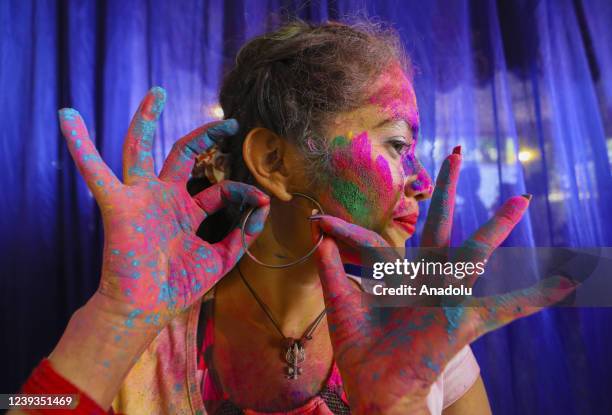 Bangladeshi people spread abir as celebration Dol Purnima festival on March 18 in Dhaka, Bangladesh.