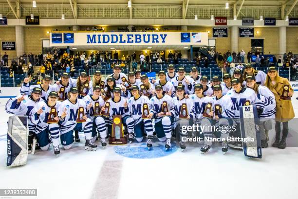 Middlebury poses with trophies after victory over Gustavus Adolphus during the Division III Women's Ice Hockey Championship held at Kenyon Arena on...