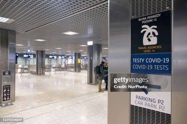 Sign for Covid-19 test in the airport terminal Kraków John Paul II International Airport KRK known as Krakow Balice airport. Check-in desks, arrival...