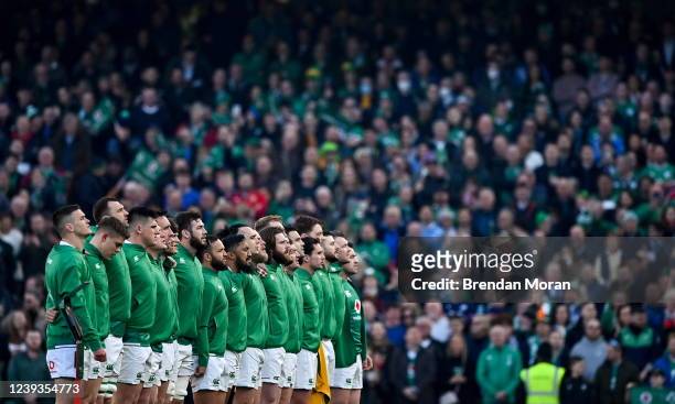 Dublin , Ireland - 19 March 2022; The Ireland team stand for the national anthems before the Guinness Six Nations Rugby Championship match between...