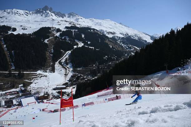 Italy's Elena Curtoni competes during the second run of the Women's Giant slalom as part of the FIS Alpine Ski World Cup finals 2021/2022 in Meribel,...