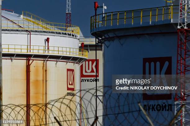 This photograph taken on March 17 shows Lukoil fuel storage tanks at Rosenets Port terminal near the city of Burgas at the Black sea coast. -...