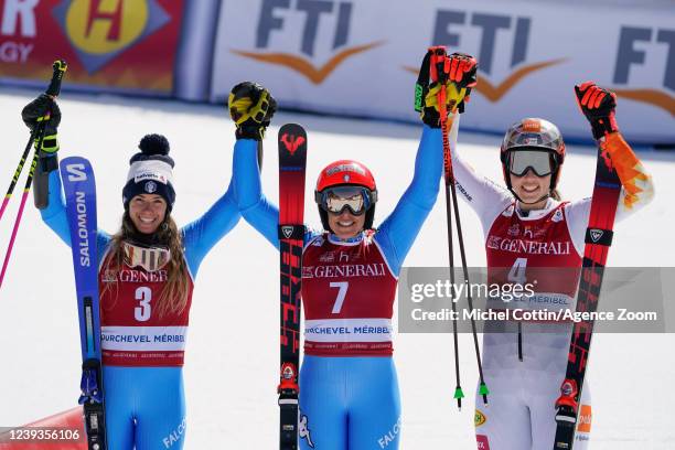 Marta Bassino of Team Italy takes 2nd place, Federica Brignone of Team Italy takes 1st place, Petra Vlhova of Team Slovakia takes 3rd place during...
