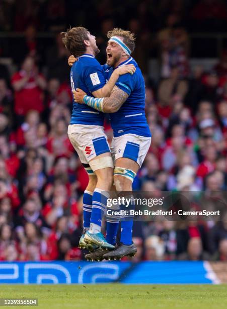 Italy's Giovanni Pettinelli and Italys Niccolo Cannone celebrate at the final whistle during the Six Nations Rugby match between Wales and Italy at...