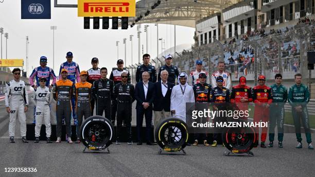 Stefano Domenicali, CEO of the Formula One Group and the President of the International Automobile Federation Mohammed ben Sulayem pose for a group...