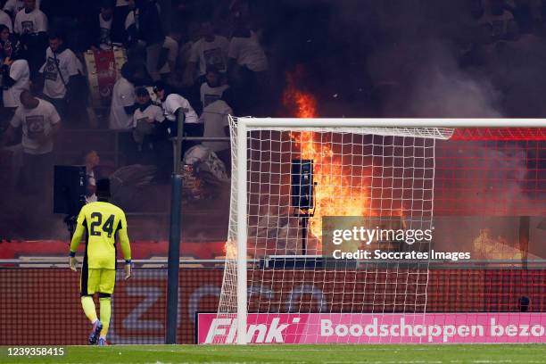 Fire in the stands of Ajax during the Dutch Eredivisie match between Ajax v Feyenoord at the Johan Cruijff Arena on March 20, 2022 in Amsterdam...