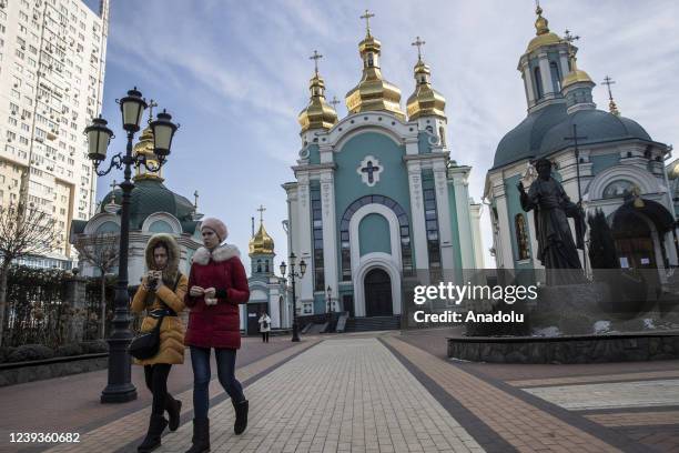 Civilians attend a Sunday mass at a church as they pray for their country amid the ongoing Russian attacks in Kyiv, Ukraine on March 20, 2022.