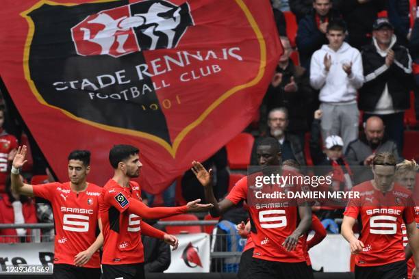 Rennes French forward Serhou Guirassy celebrates his goal with Rennes French forward Martin Terrier during the French L1 football match between Stade...