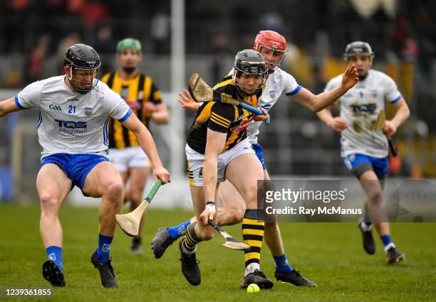 Kilkenny , Ireland - 20 March 2022; Walter Walsh of Kilkenny is tackled by Conor Dalton and DJ Foran of Waterford, left, during the Allianz Hurling...
