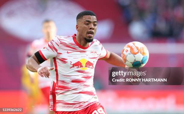 Leipzig's German defender Benjamin Henrichs eyes the ball during the German first division Bundesliga football match RB Leipzig v Eintracht Frankfurt...