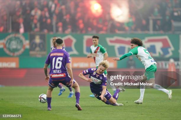 Robert Ljubicic of Rapid tackles Matthias Braunoeder of Austria Wien during the Admiral Bundesliga match between SK Rapid Wien and FK Austria Wien at...