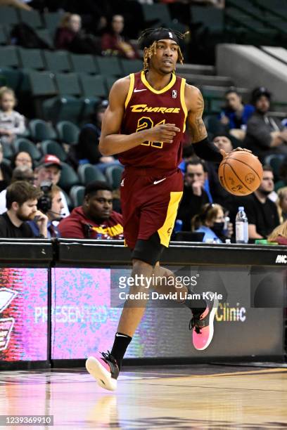 Wes Iwundu of the Cleveland Charge dribbles the ball against the College Park SkyHawks on March 20, 2022 in Cleveland, Ohio at the Wolstein Center....
