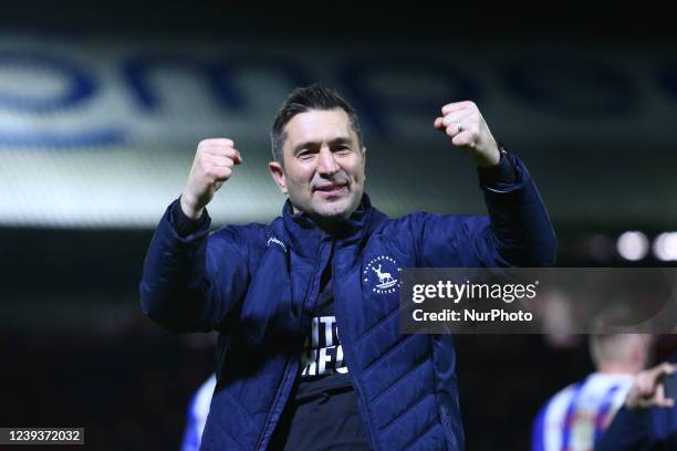 Hartlepool United manager, Graeme Lee, celebrates with the fans at full time during the Sky Bet League 2 match between Newport County and Hartlepool...